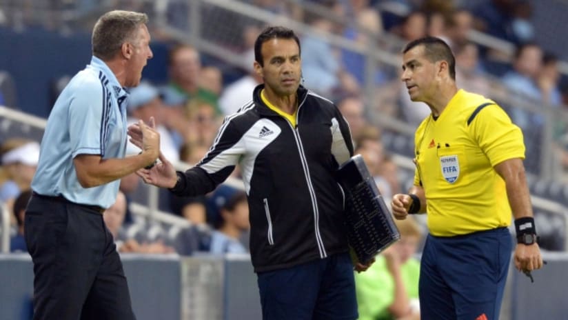 Peter Vermes argues with officials