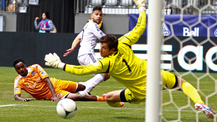 Creavelle and Hall watch ball go past post, Houston Dynamo, Vancouver Whitecaps