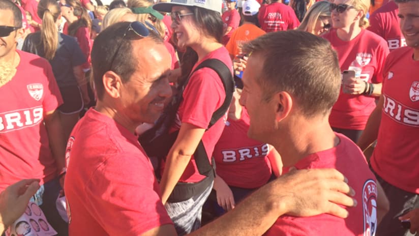 FC Dallas coach Oscar Pareja and NYCFC coach Jason Kreis embrace at the Dallas Heart Walk