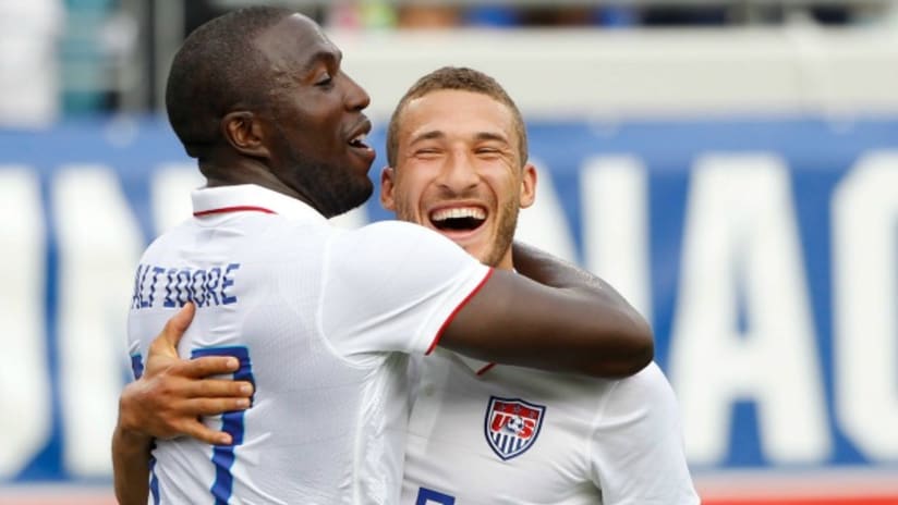 Jozy Altidore and Fabian Johnson celebrate a goal for the USMNT
