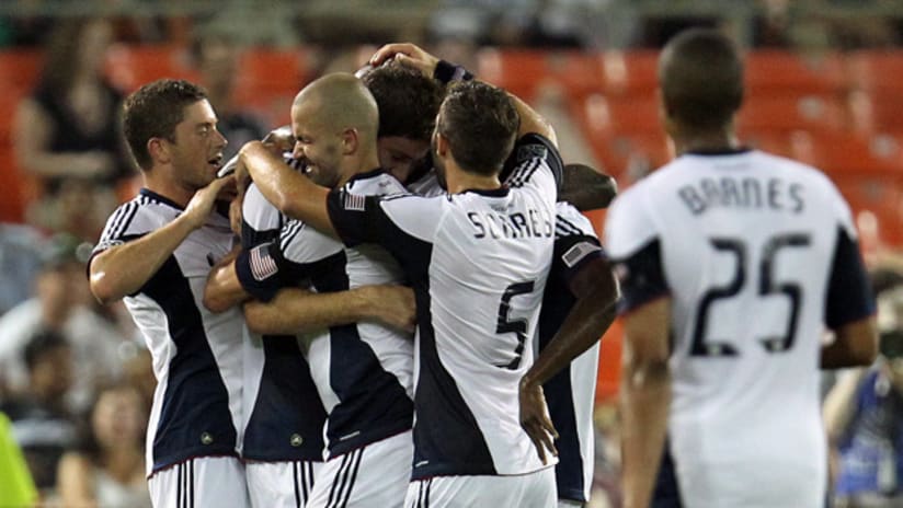 Members of the New England Revolution celebrate a goal on Wednesday against D.C. United.