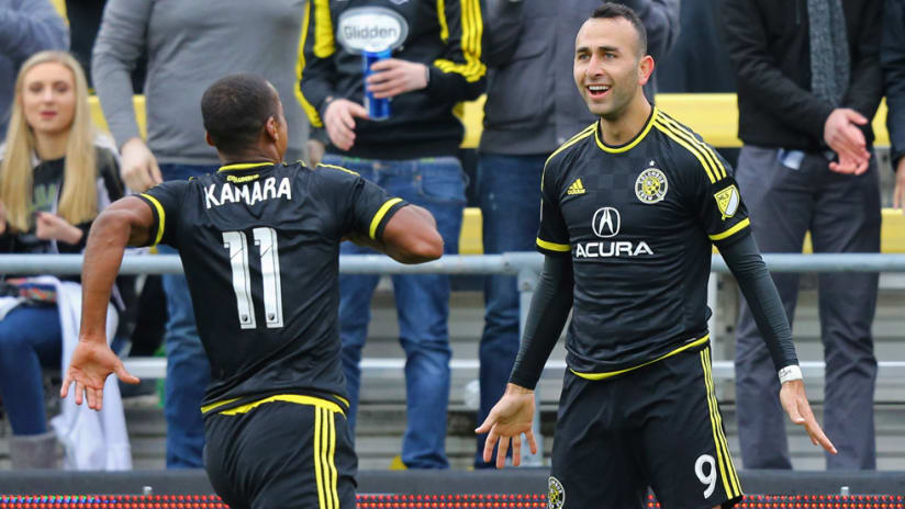 Justin Meram - Columbus Crew SC - celebrates a goal with Ola Kamara