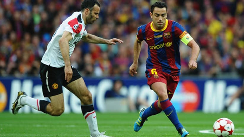 Ryan Giggs chases Xavi during the 2011 UEFA Champions League final.