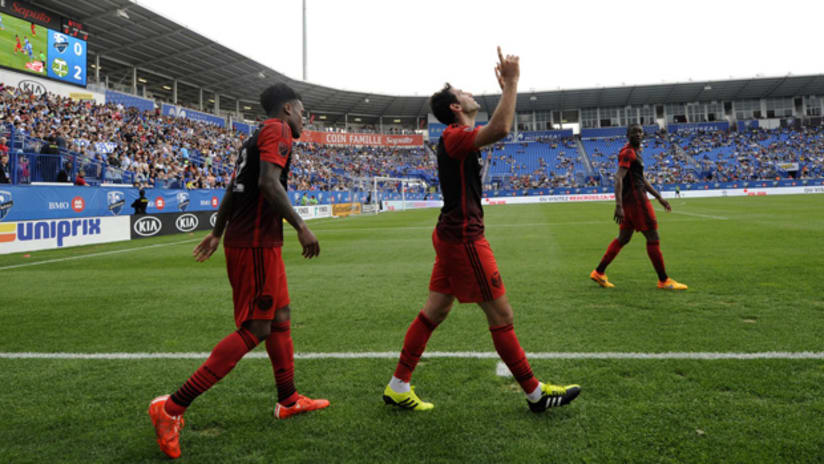 Diego Valeri of the Portland Timbers points skyward after scoring vs. Montreal Impact