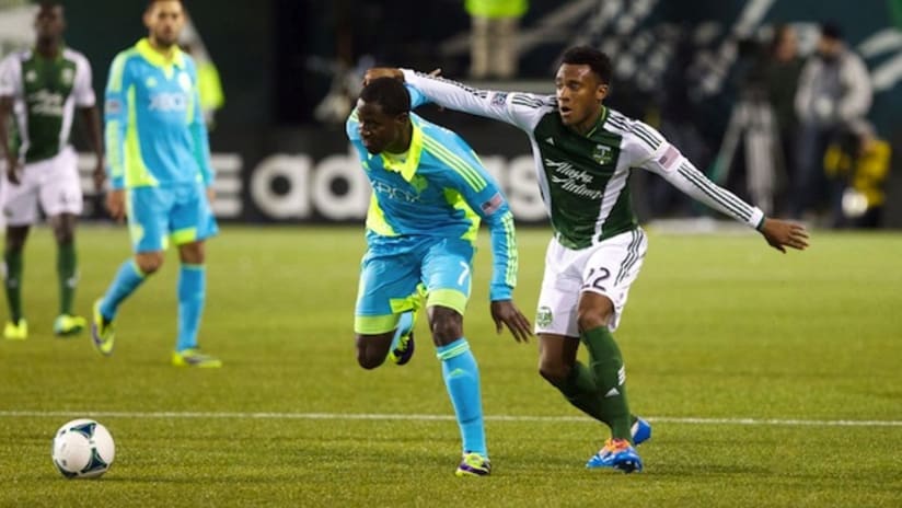 Eddie Johnson is challenged by Rodney Wallace