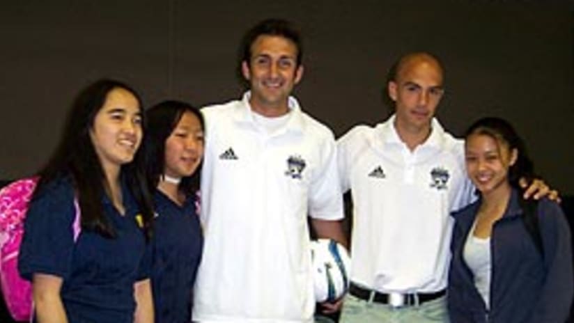 Ryan Cochrane and Chris Aloisi pose with some fans at Sierramont Middle School.