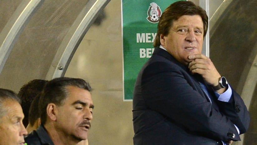 Miguel Herrera - looks over his shoulder - coaching Mexico in 2015