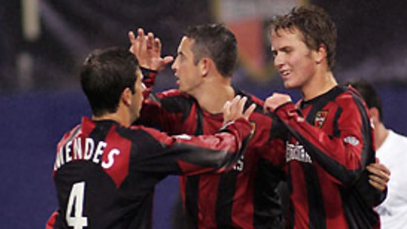 Michael Bradley (right) scored the game-winning goal in the first leg of the '05 playoffs.