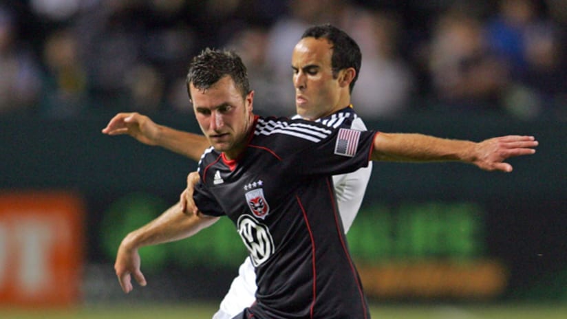 D.C. United's Stephen King (left) battles the Galaxy's Landon Donovan during a match in 2010.