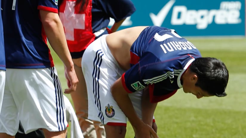Chivas USA's Marcos Mondaini reacts to his injuring RSL's Javier Morales.