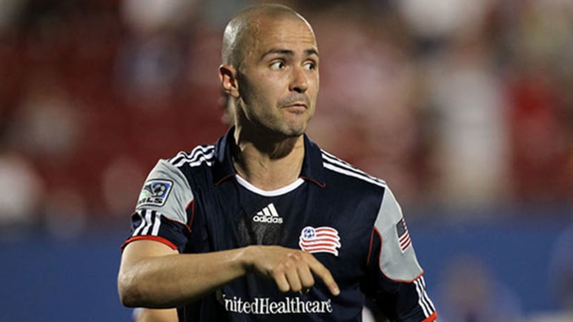 Rajko Lekic of the New England Revolution points something out.