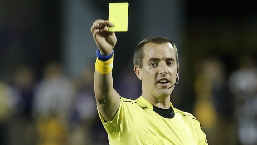 Referee Mark Geiger - holding a card - May 21, 2016