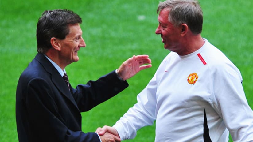 Andy Roxburgh, now with the New York Red Bulls, greets Manchester United's Alex Ferguson.