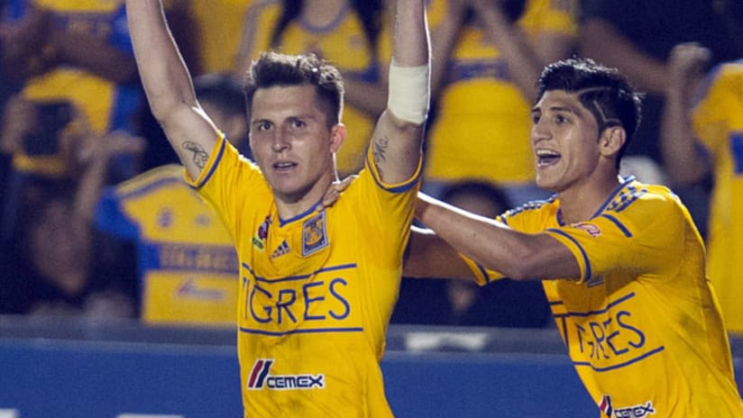 Jose Torres celebrates a goal for Tigres