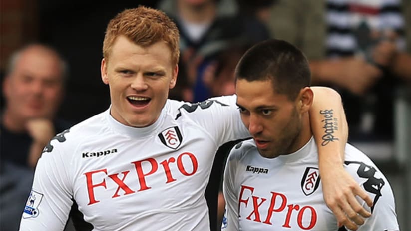 Clint Dempsey (right) is congratulated by Fulham teammate John Arne Riise