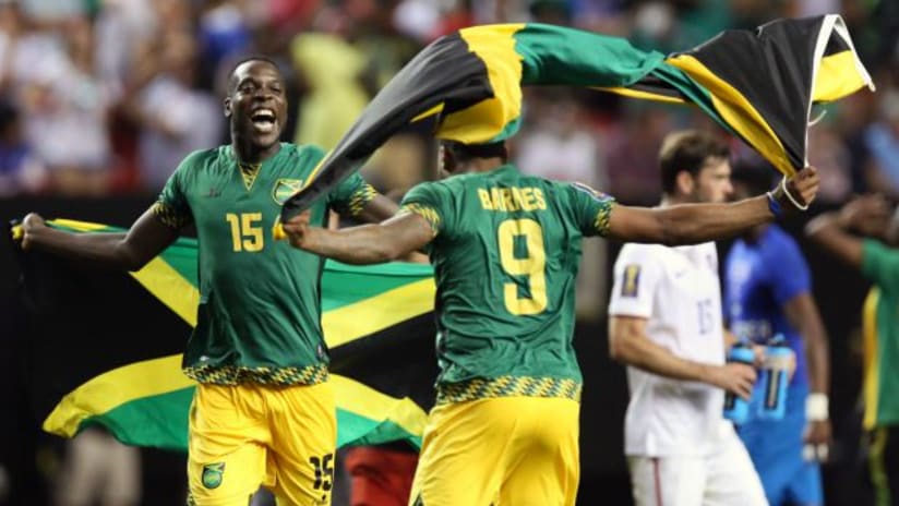 Je-Vaughn Watson and Giles Barnes (Jamaica) celebrate after beating US, 2015 Gold Cup