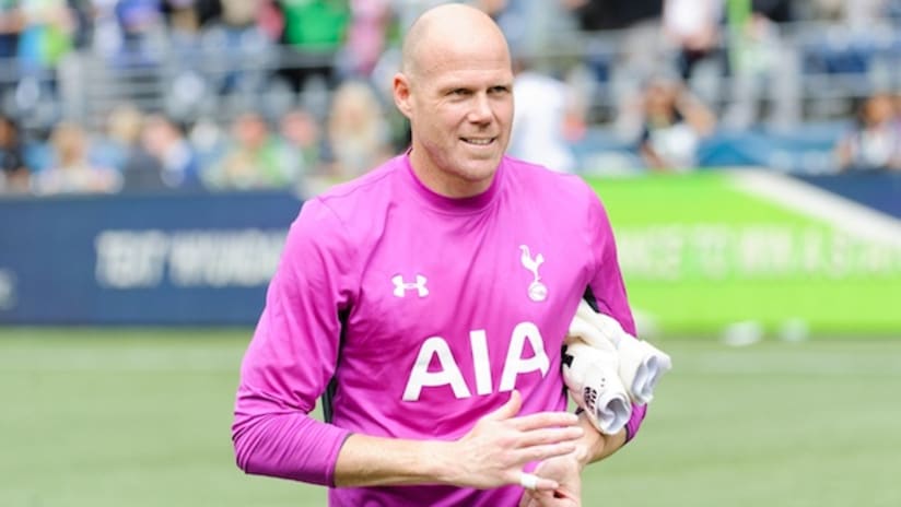 Brad Friedel warms up for Tottenham
