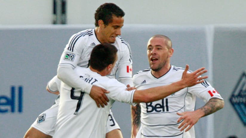 Members of the Vancouver Whitecaps celebrate during their 1-0 win over Philadelphia on June 18.