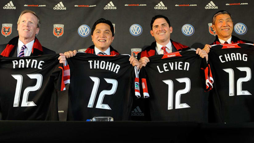 D.C. United President and CEO Kevin Payne poses for a photo with owners Erick Thohir, Jason Levien, and Will Chang