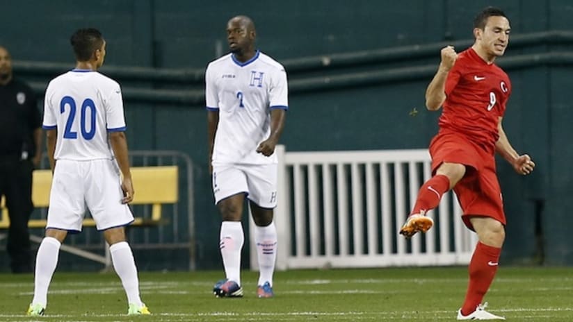 Turkey forward Mevlut Erding celebrates a goal against Honduras