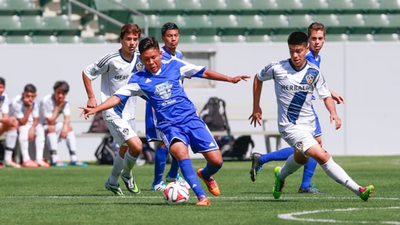 Sueno MLS 2014 winner Johnny Chavarria in action against the LA Galaxy Academy