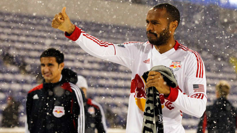 Thierry Henry gives the thumbs up in the snowstorm