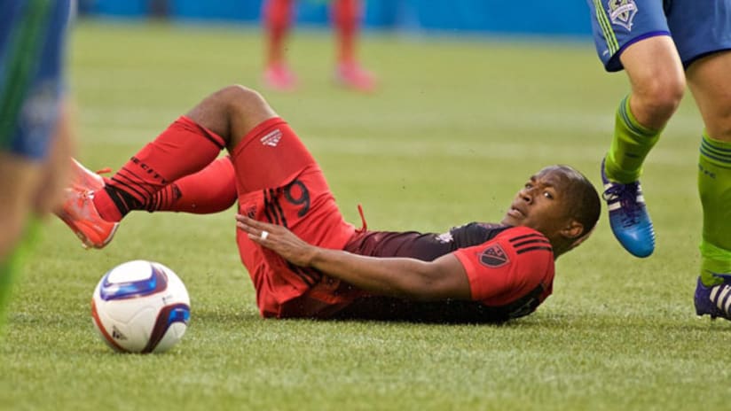 Darlington Nagbe (Portland Timbers) on the ground after being fouled vs. the Seattle Sounders