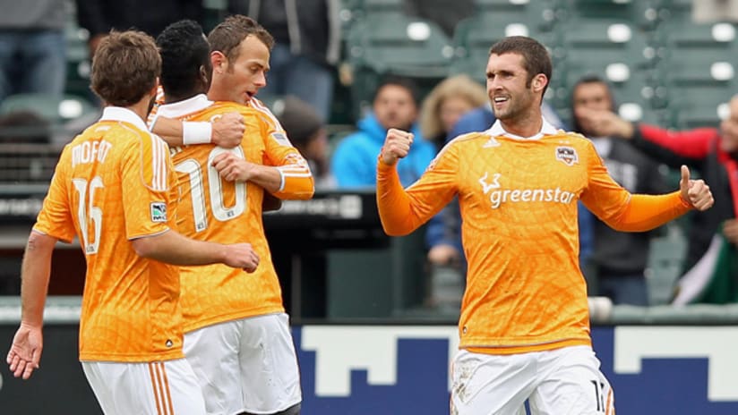 Members of the Houston Dynamo celebrate during a 1-0 win over the San Jose Earthquakes.