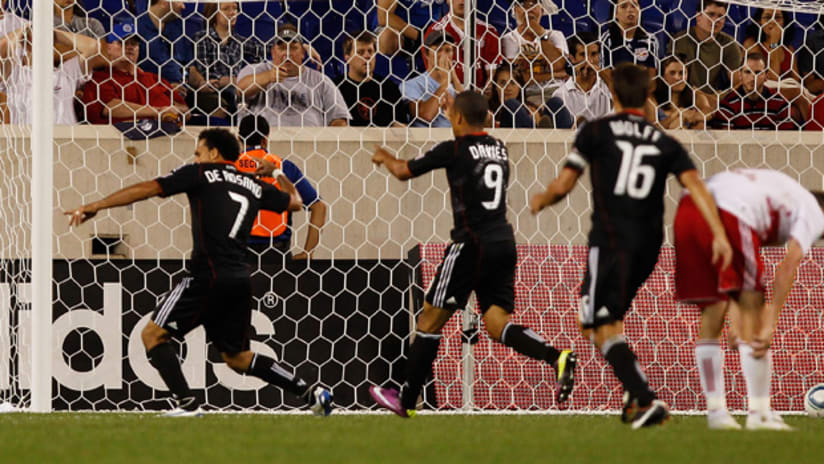 Dwayne De Rosario celebrates his game-winning goal against New York on Saturday night.