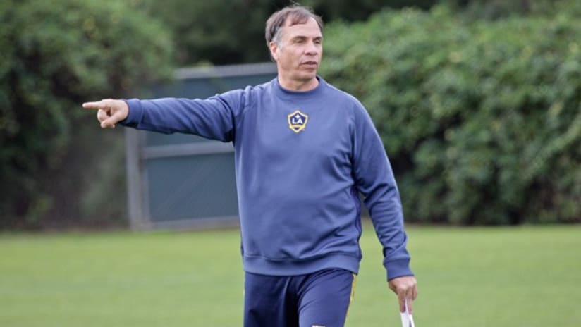 Bruce Arena gives the Galaxy directions during the preseason