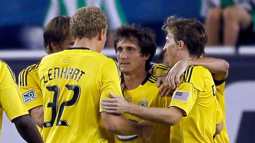 A penalty kick by Guillermo Barros Schelotto ensured the Crew didn't drop their third straight match.