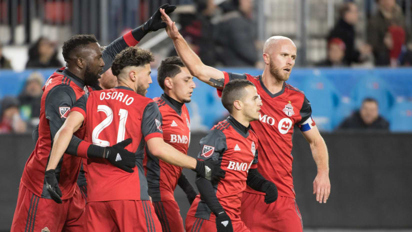 Toronto FC — several players congratulating each other — 3/30/18