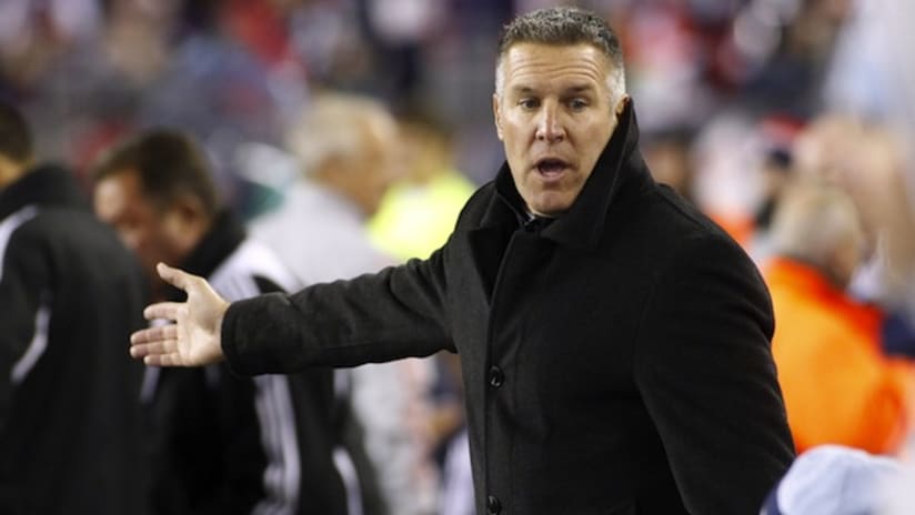 Peter Vermes reacts to a call in Sporting KC's playoff game against New England