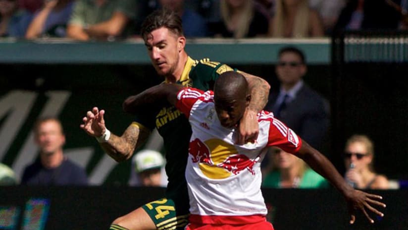 Portland Timbers defender Liam Ridgewell and New York Red Bulls forward Bradley Wright-Phillips fight for positioning
