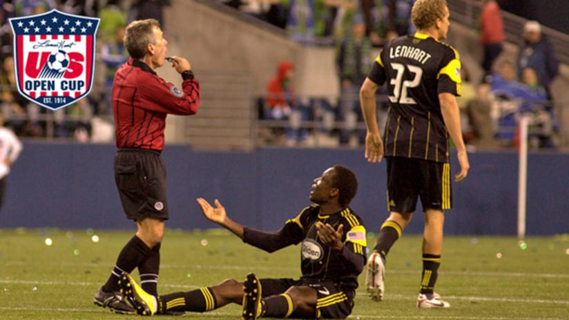 The Crew's Emmanuel Ekpo argues for a call during the US Open Cup Final on Tuesday night at Qwest Field.