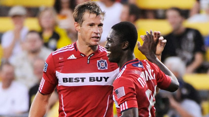 Both Brian McBride (left) and Patrick Nyarko are facing injury issues as the Fire host RSL on Thursday.