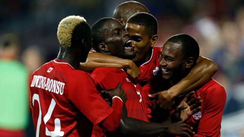 CanMNT celebrate Canada's win over Jamaica