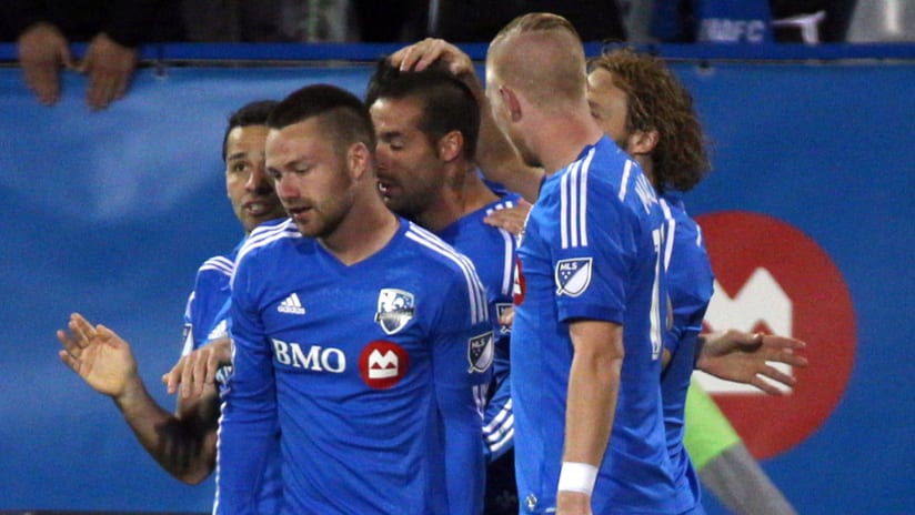 Jack McInerney and Montreal Impact celebrate in MTLvDAL