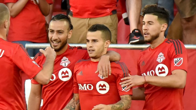 Sebastian Giovinco - Toronto FC - gets congratulated after goal in Canadian Championship