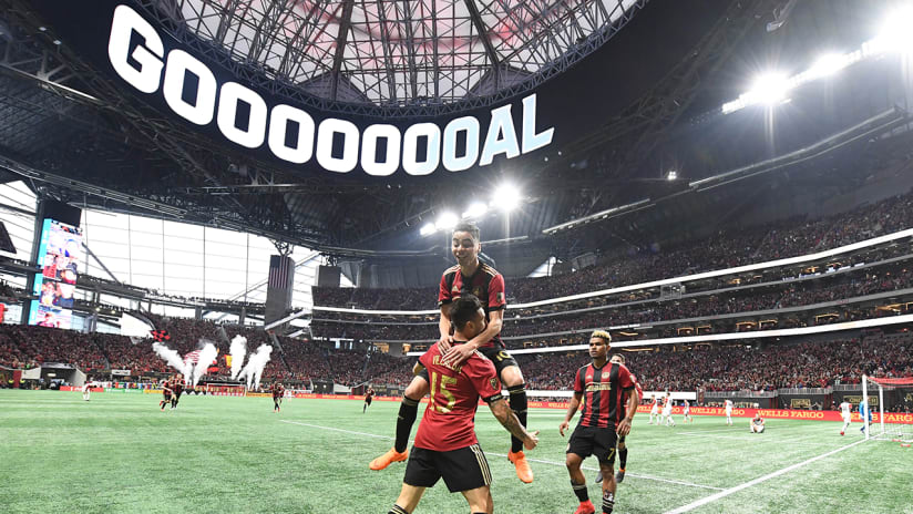 Miguel Almiron, Hector Villalba - Atlanta United - celebrate at Mercedes-Benz Stadium