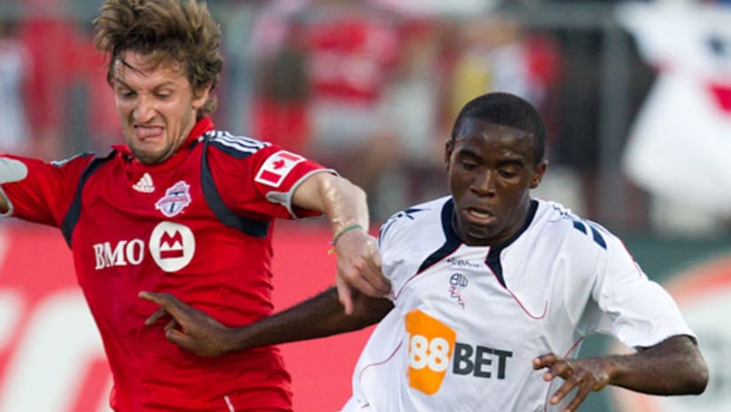 Mista (left) debuted for Toronto on Wednesday against the EPL's Bolton Wanderers.