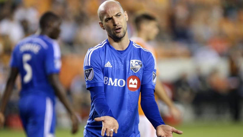 Laurent Ciman reacts after a play in the Montreal Impact-Houston Dynamo game