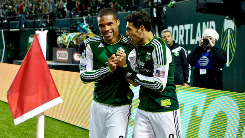 Ryan Johnson and Diego Valeri celebrate a preseason goal