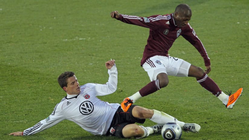 D.C. United's Marc Burch strips Colorado's Sanna Nyassi of the ball during the Rapids' 4-1 win on Sunday.