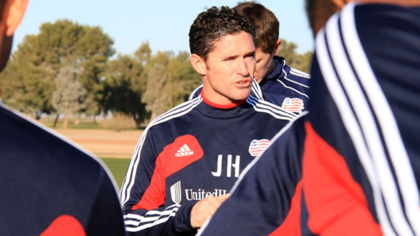 Revolution head coach Jay Heaps instructs his players.