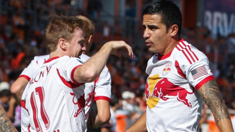 Dax McCarty and Tim Cahill celebrate Cahill's 8-second goal vs. Houston