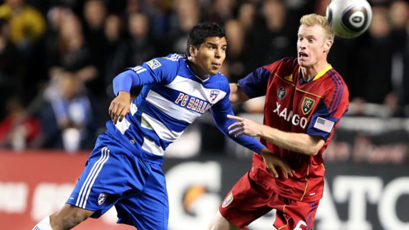FC Dallas' Ruben Luna and Real Salt Lake's Nat Borchers vie for the ball during a 2010 playoff game.