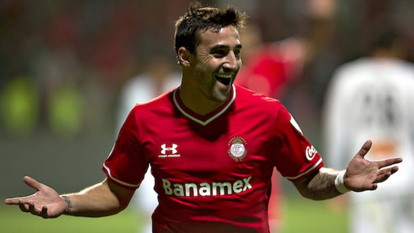 Toluca's Juan Manuel Salgueiro celebrates a goal in the CCL