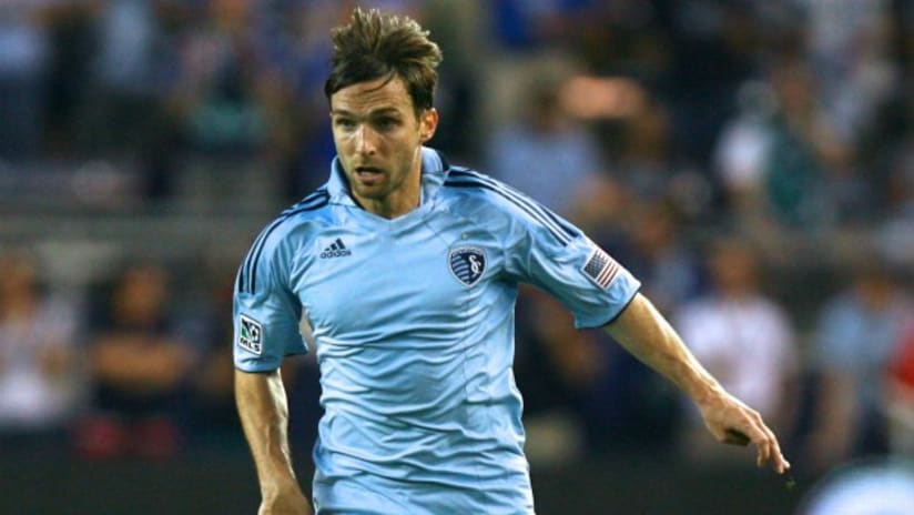 Sporting KC's Bobby Convey runs with the ball
