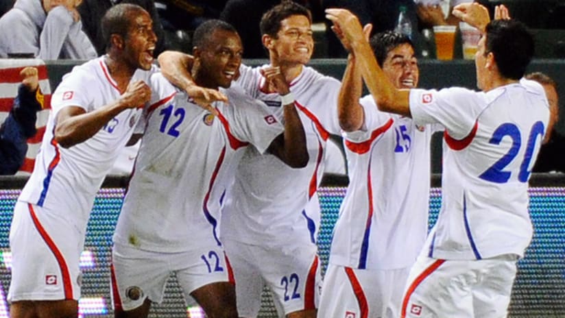 Costa Rica's Rodney Wallace (second from left) celebrates his goal vs. the US.